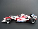 1:43 Minichamps Toyota TF104 2004 Red W/White Stripes. Uploaded by indexqwest